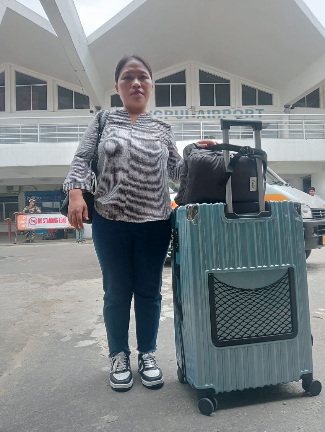Apex Maids helper photographed at the airport on her travel day
