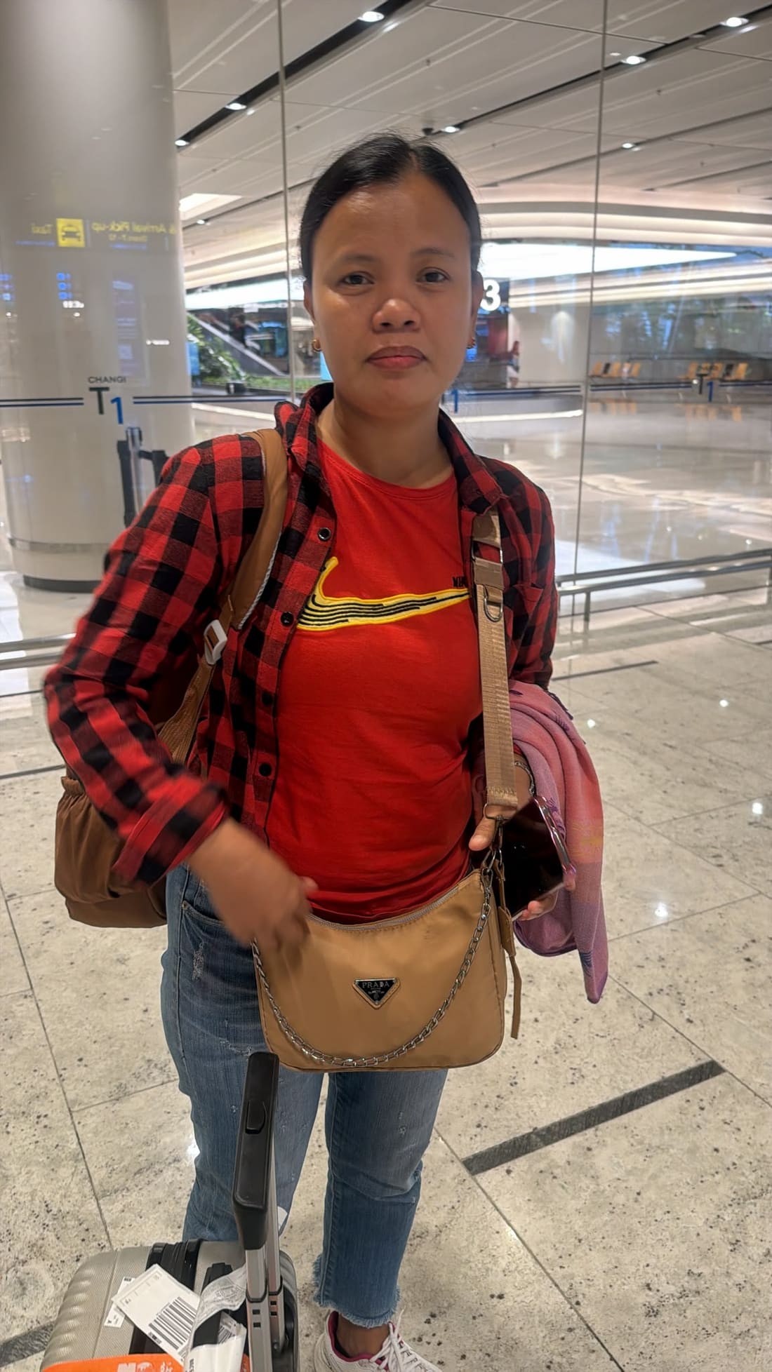 Apex Maids helper photographed at the airport on her travel day