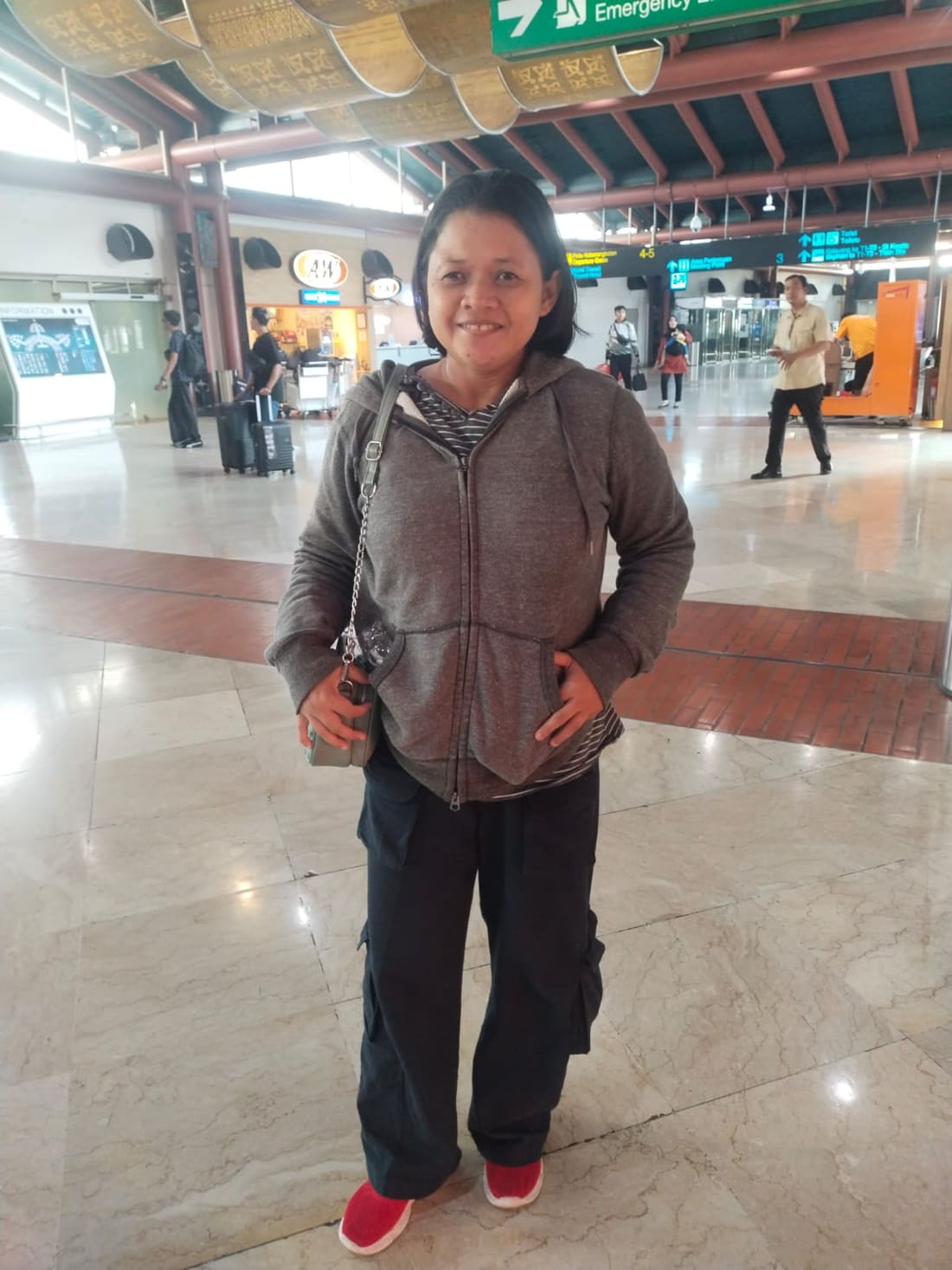 Apex Maids helper photographed at the airport on her travel day